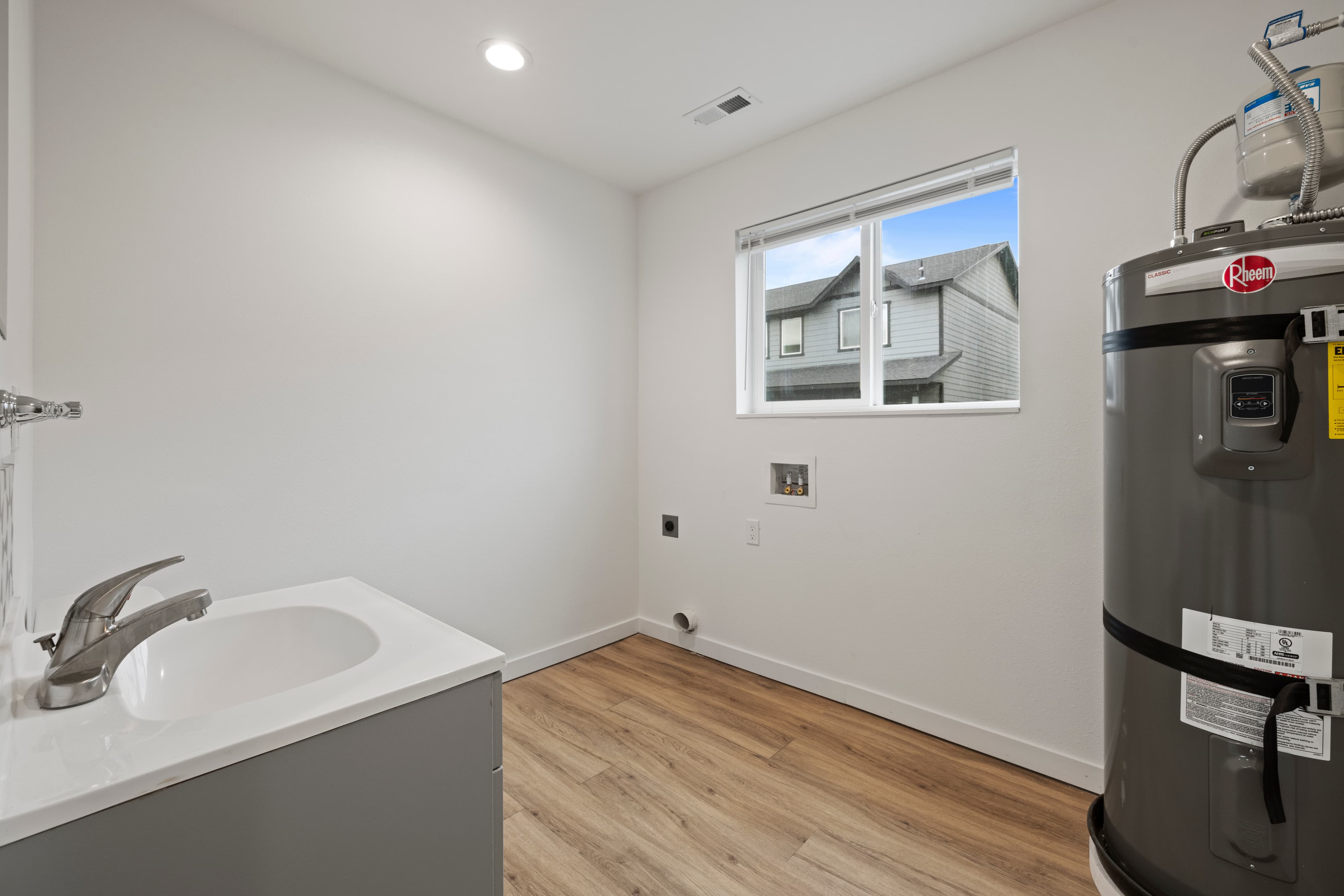 Cheap New Apartments in Moses Lake — Plank flooring and trim detail inside a Marina Shore Villas townhome