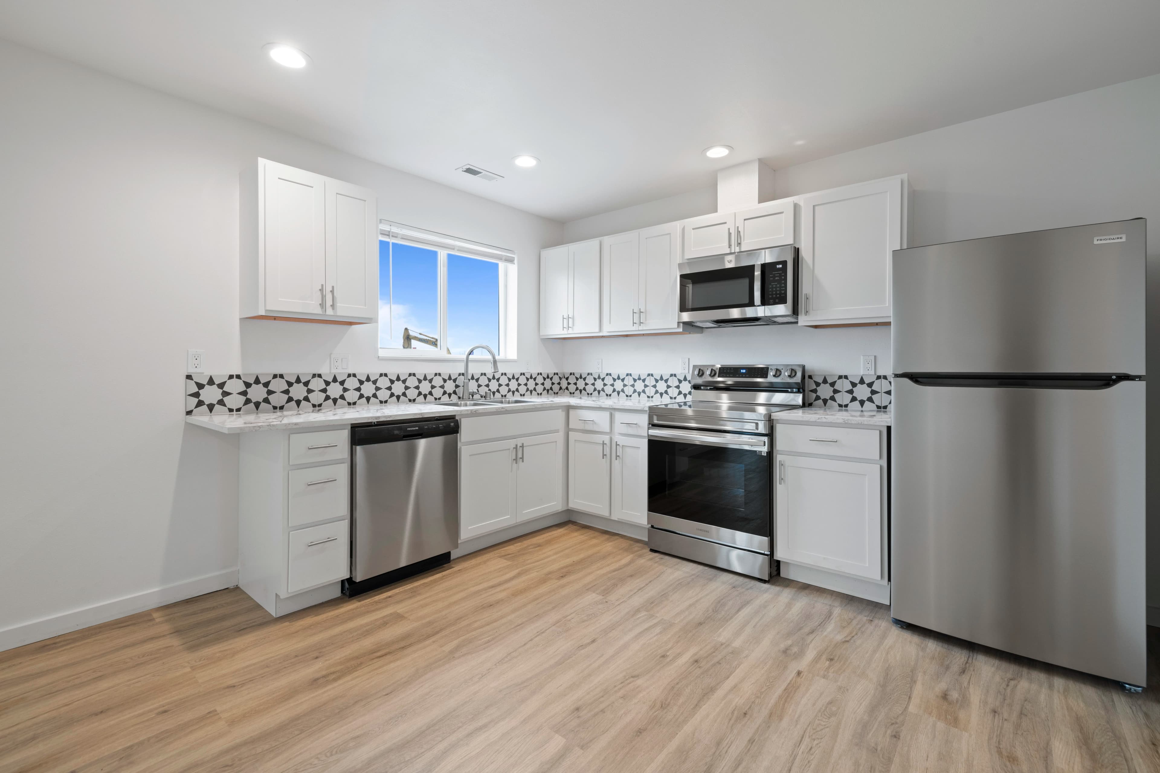 Kitchen island and cabinetry inside a Marina Shore Villas townhome