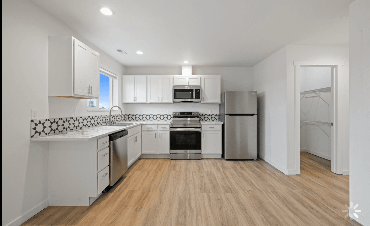 Primary bedroom with private ensuite in a 2 bedroom Marina Shore Villas townhome