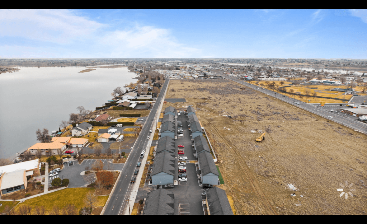 Aerial drone view of Marina Shore Villas lakefront townhomes on Marina Drive, Moses Lake WA